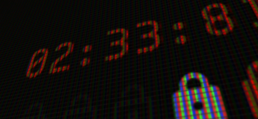 Escape Team MDM - A digital countdown timer and lock icon on a dark pixelated screen