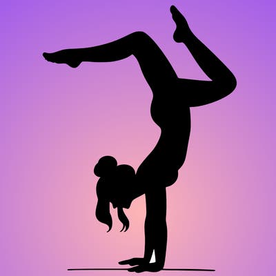 a woman doing a handstand