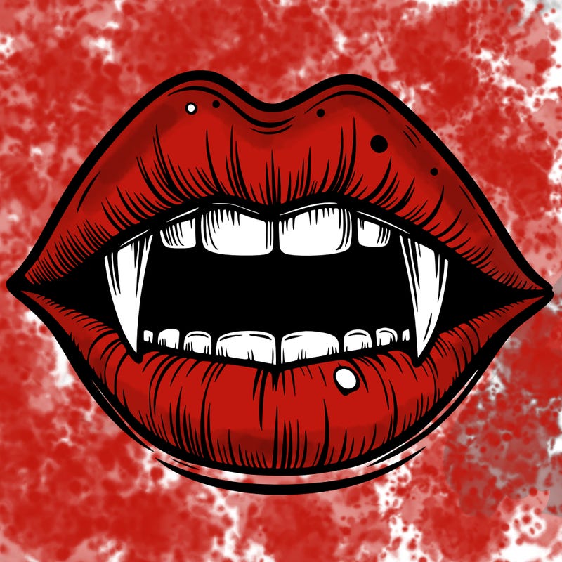lips with vampire teeth