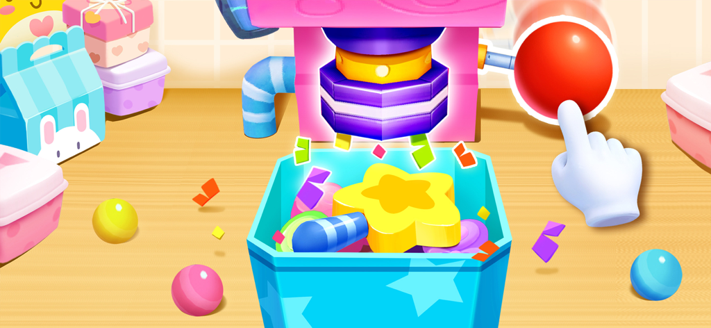 A hand pressing a big red button on a colorful candy machine to dispense star shaped treats