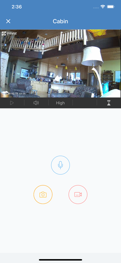 Alula Security app live camera feed showing cabin interior with microphone and recording controls