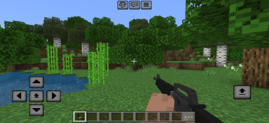 Gun Addons for Minecraft - Vista en primera persona de un jugador sosteniendo un rifle en Minecraft.