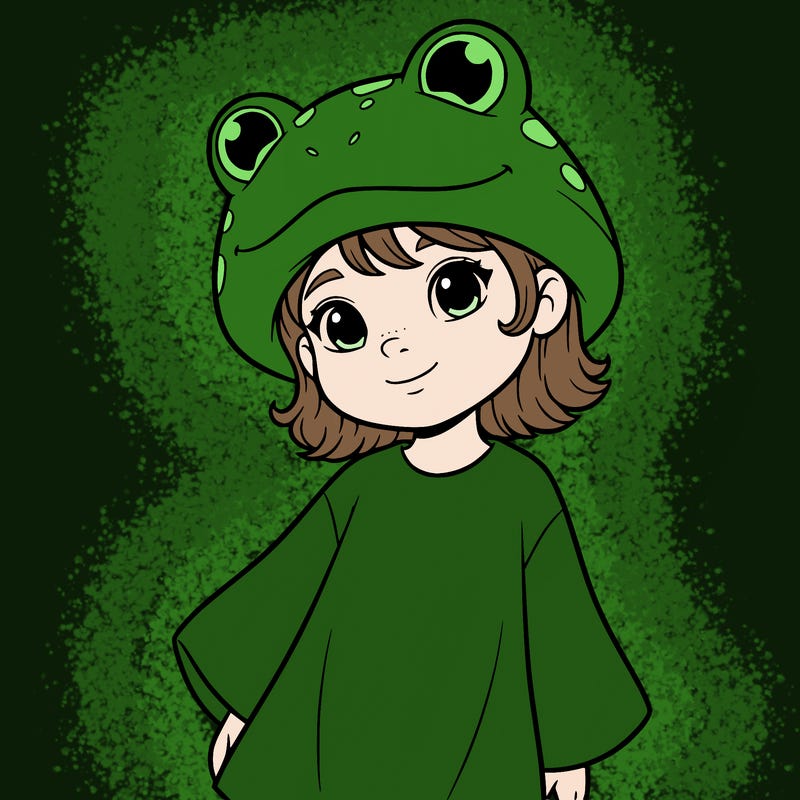 a girl wearing a frog hat