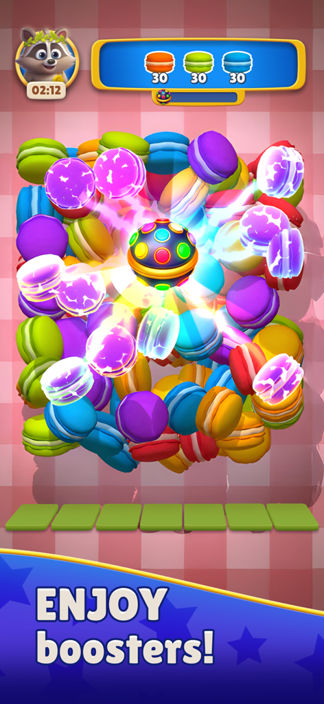 A screenshot of Mighty Match 3D showing a booster clearing colorful 3D macarons