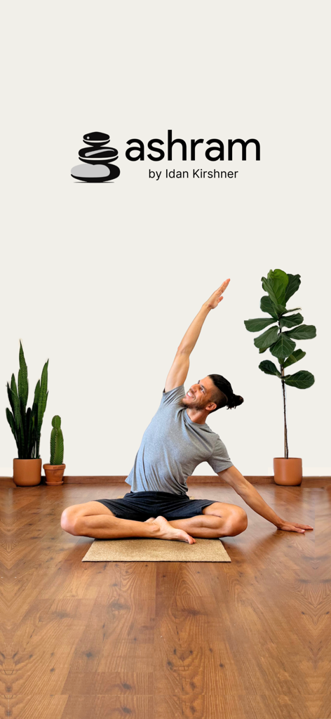 Man practicing a seated yoga side stretch in a minimalist room