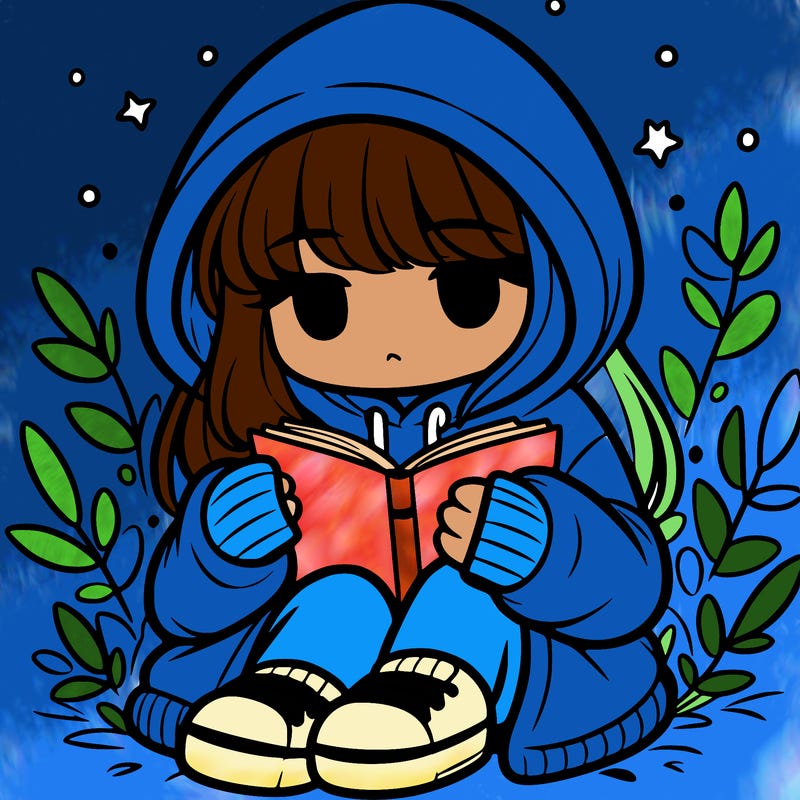 girl in oversized hoodie reading a book