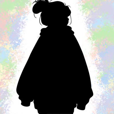 realistic girl with a oversized sweatshirt on and a bun