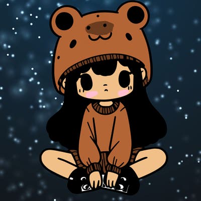 a girl wearing a frog hat and some frog socks