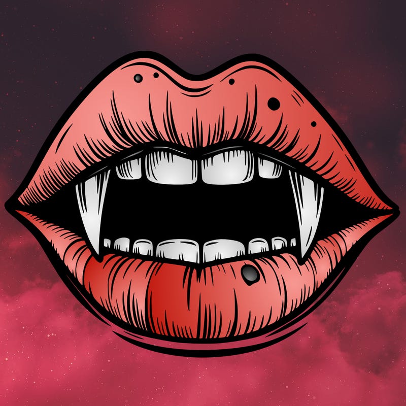 lips with vampire teeth