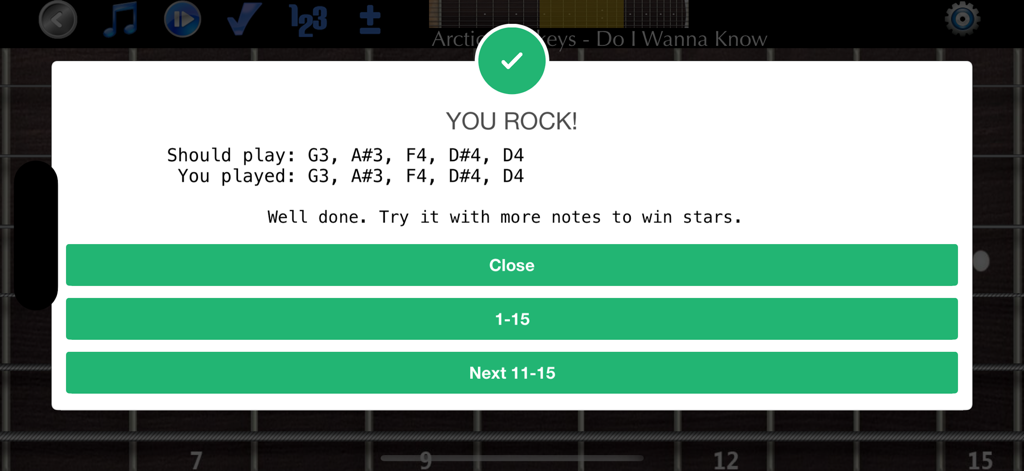 Guitar Riff - Play by Ear - Pantalla de éxito en la aplicación Guitar Riff con un mensaje "You Rock" por tocar notas correctamente.