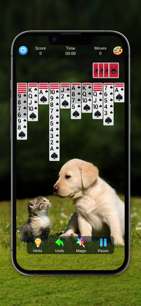 Spider Solitaire gameplay with a puppy and kitten background