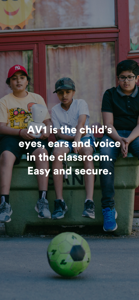 AV1 - Three boys sitting outside with the AV1 robot representing an absent classmate