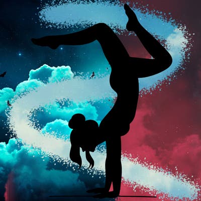 a woman doing a handstand