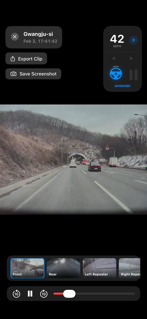 Tesla DashCam Viewer - Tesla DashCam Viewer app interface showing front camera footage with a driving telemetry HUD and camera angle selections.