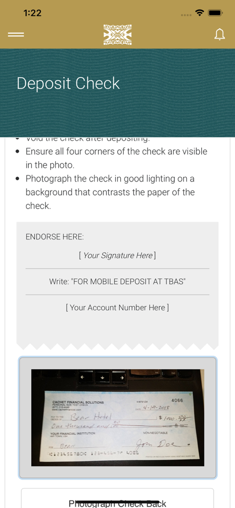 TBAS - Mobile check deposit screen in the TBAS app showing endorsement instructions and a photo preview of a check