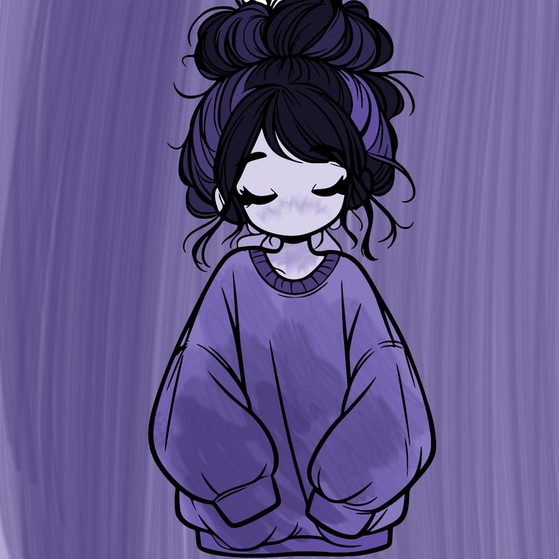 girl with baggy sweatshirt and messy bun