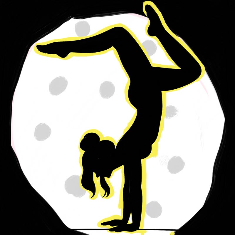 a woman doing a handstand