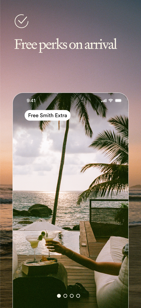 Luxury tropical hotel sunset view with two cocktails and text promoting free perks on arrival