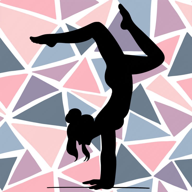 a woman doing a handstand