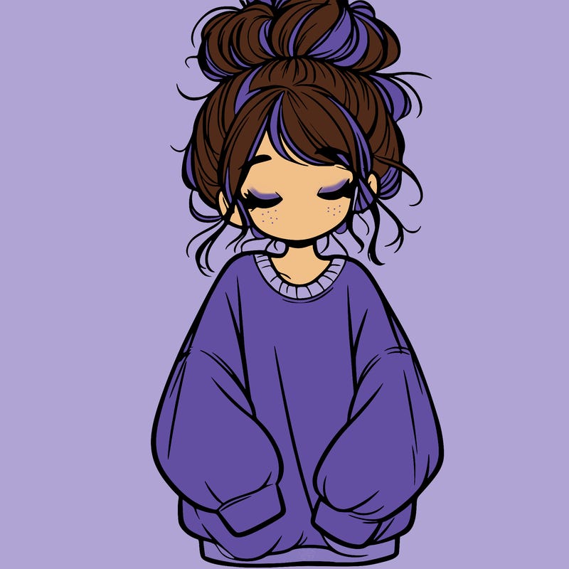 girl with baggy sweatshirt and messy bun