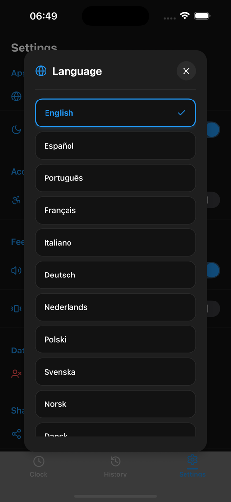 Grandmaster Chess Clock - Language selection menu in the Grandmaster Chess Clock app showing options for English, Spanish, and other languages in a dark theme interface.