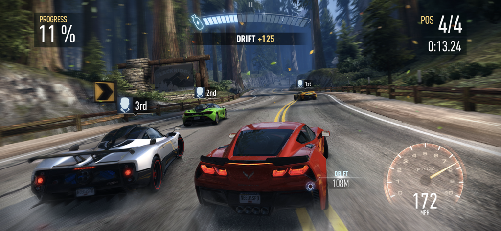 High-speed street race in Need for Speed No Limits featuring a red corvette drifting on a forest road