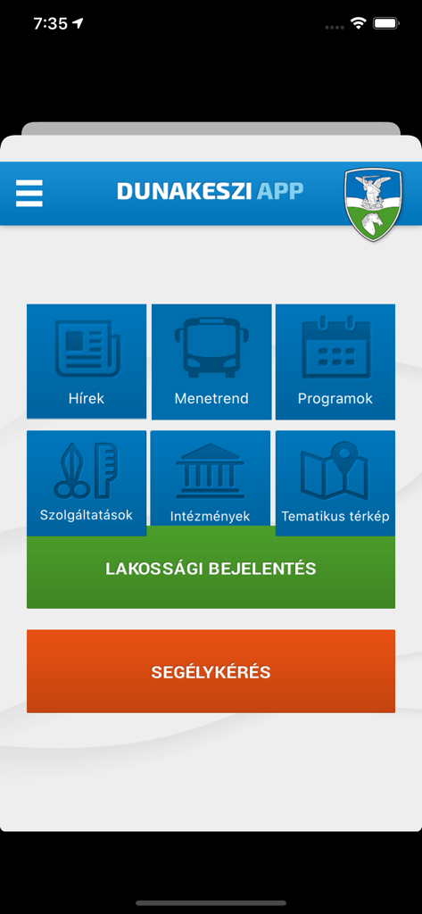 Main dashboard of Dunakeszi IntermApp showing icons for local news, transit schedules, events, and resident reporting buttons.