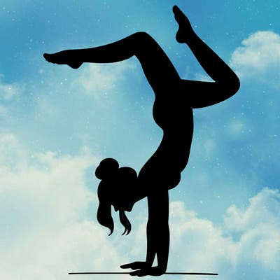a woman doing a handstand