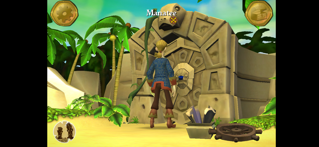 Tales of Monkey Island Ep 1 - Guybrush Threepwood de pie frente a una gran foca de piedra etiquetada como Manatí en una isla tropical