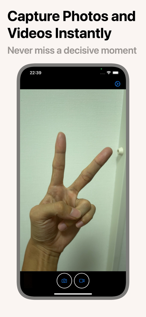 Pasya! - The Fastest Camera - iPhone screen displaying the Pasya app interface capturing a photo of a hand making a peace sign with text saying Capture Photos and Videos Instantly
