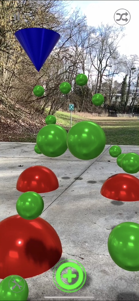Sound Drop AR - Augmented reality music creation interface showing red and green reactors placed on an outdoor concrete path