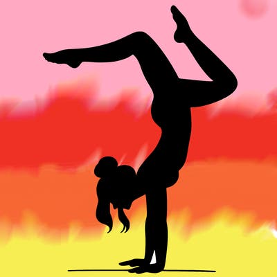 a woman doing a handstand