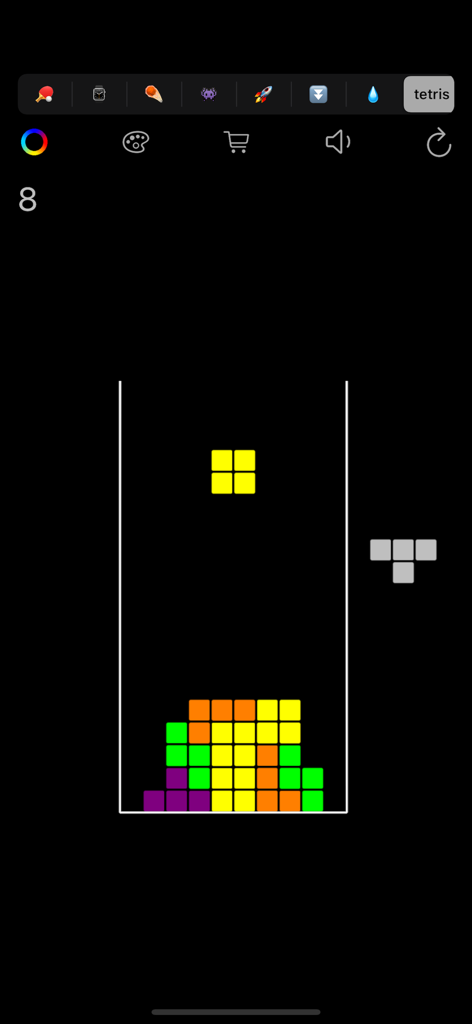 Tetris gameplay mode in the Ping Pong retro game app showing colorful blocks and falling shapes.