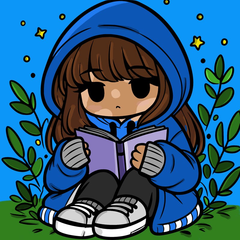 girl in oversized hoodie reading a book