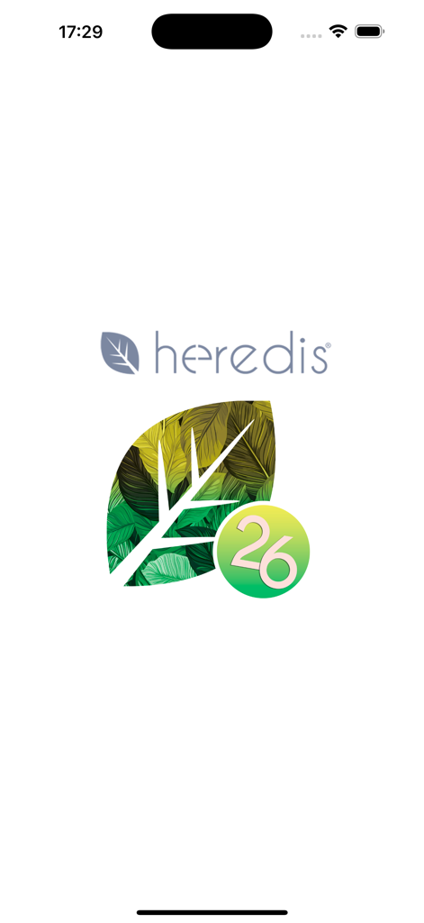 Heredis 2026 genealogy app launch screen with green leaf logo and version number