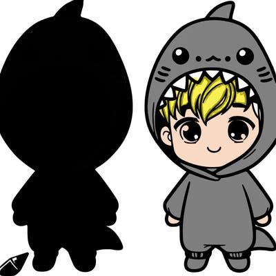 a cute boy wearing a shark onesie