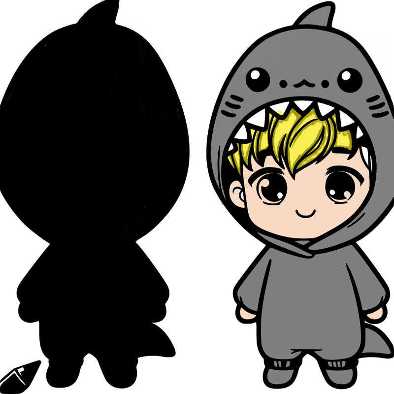 a cute boy wearing a shark onesie