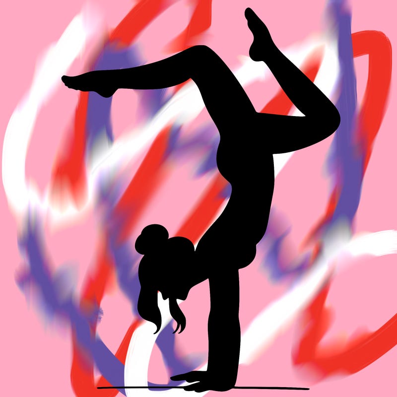 a woman doing a handstand