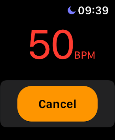 Interfaz de Apple Watch mostrando una medición de frecuencia cardíaca de 50 LPM con un botón de cancelar