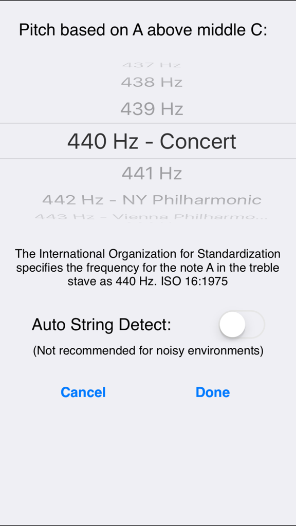 The settings screen of the Guitar Tuner app showing pitch frequency adjustment and the auto string detect toggle