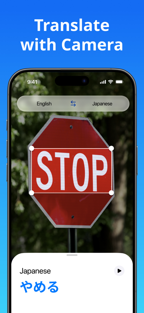 A smartphone using the Translate Now app camera feature to translate an English stop sign into Japanese