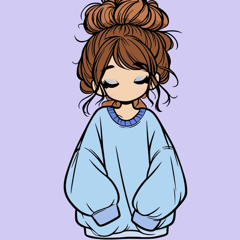 girl with baggy sweatshirt and messy bun