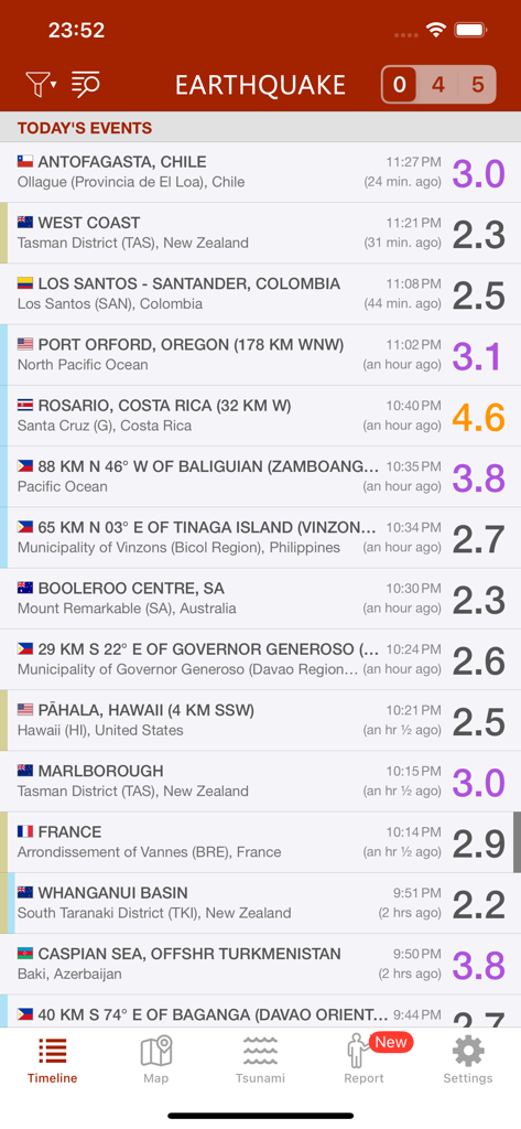 A smartphone screen showing a list of recent worldwide earthquake events with magnitudes and locations in the Earthquake app.