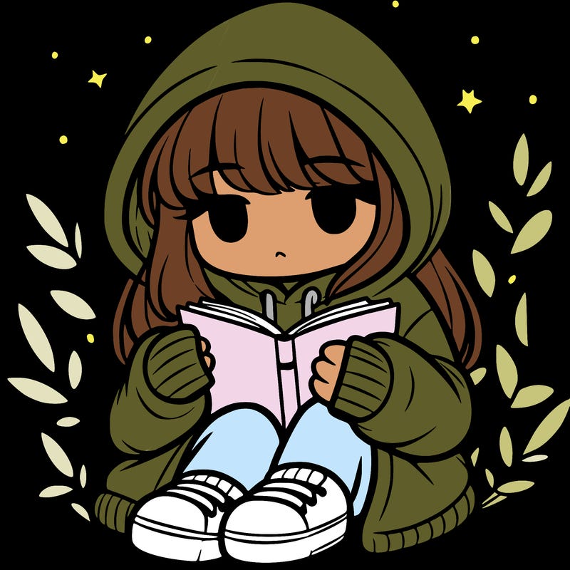 girl in oversized hoodie reading a book