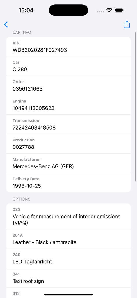 VIN decoder for Mercedes-Benz - Interfaz de la aplicación decodificadora de VIN de Mercedes-Benz que muestra especificaciones del automóvil y opciones de fábrica como el interior de cuero.