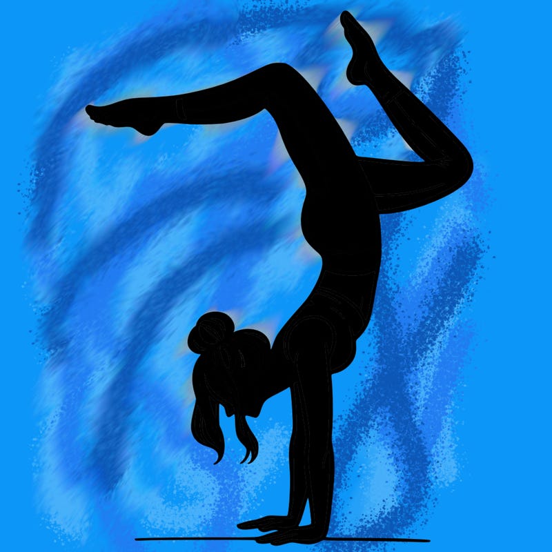 a woman doing a handstand