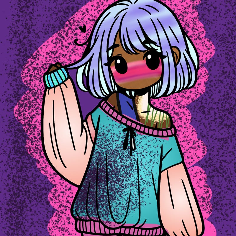 girl in baggy sweater hanging off her shoulder