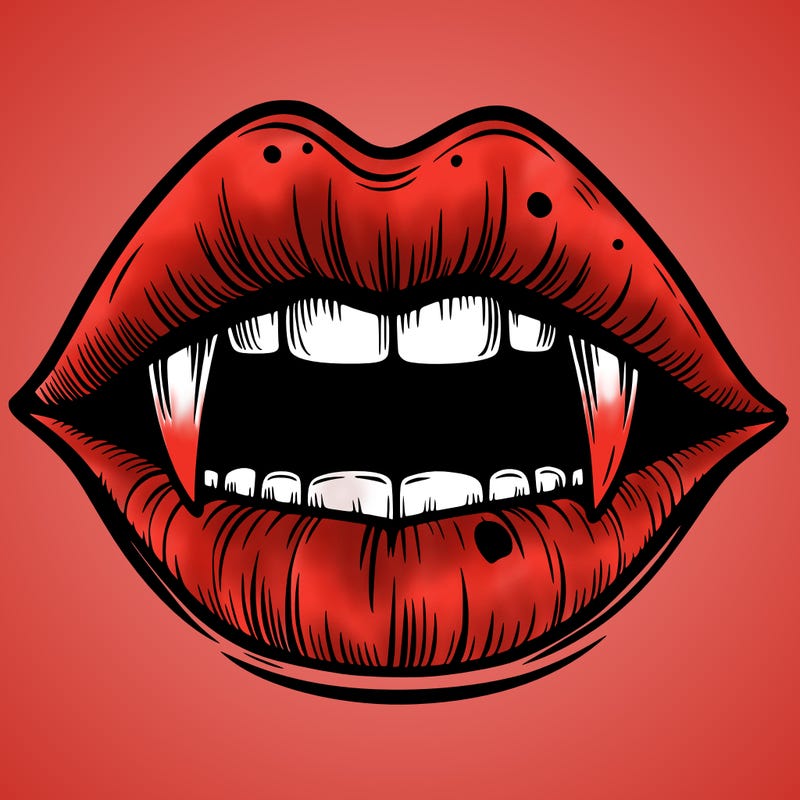 lips with vampire teeth