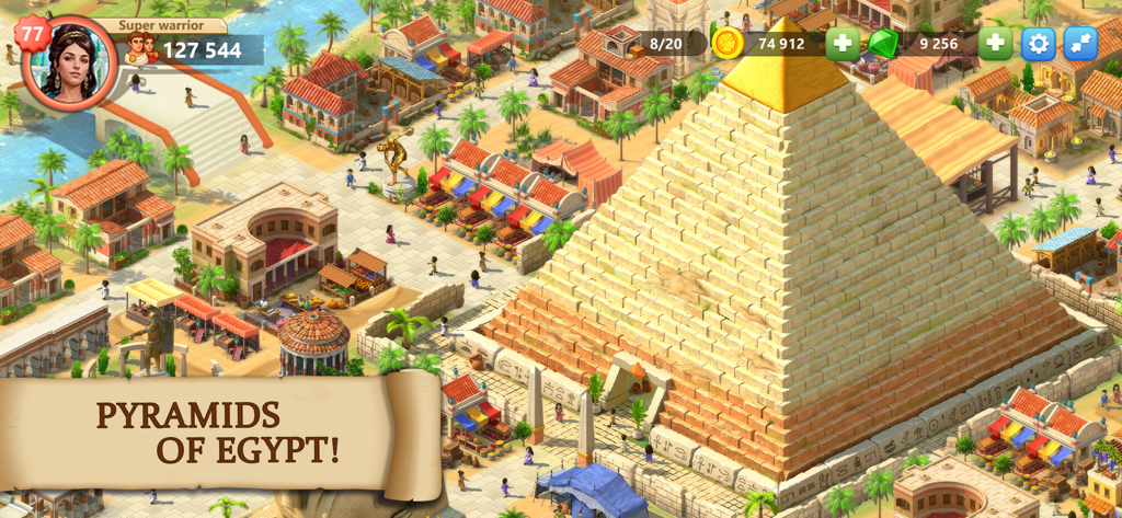 エンパイア・シティ：文明の夜明けのゲームプレイ画面、巨大なエジプトのピラミッドと古代都市の建築をフィーチャー