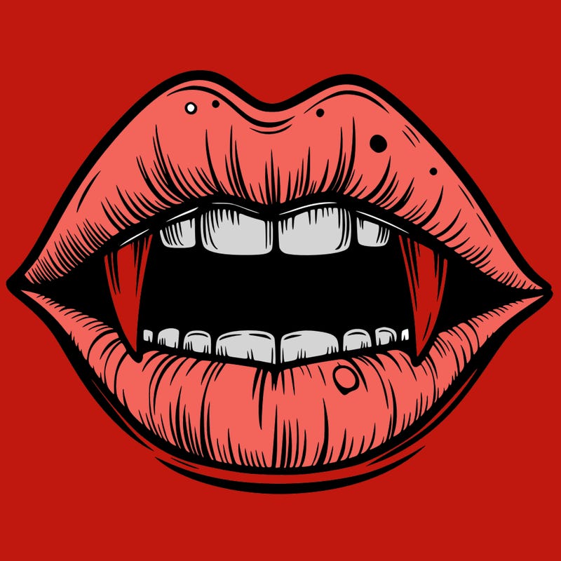 lips with vampire teeth